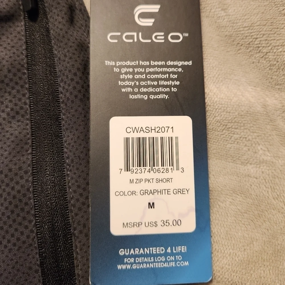 Caleo Men's active shorts size Medium with zip up pockets NWT graphite grey